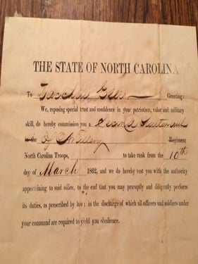 The State of North Carolina Commission for Zaccheus Ellis as second Lieutenant of Artillery as of 10 March 1862, signed by Henry T. Clark (North Carolina Civil War Governor).