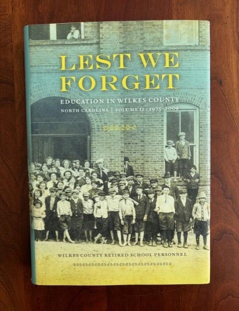 Item #101402 Lest We Forget: Education in Wilkes County, North Carolina, Volume II: 1975-2009. Wilkes County Retired Personnel.