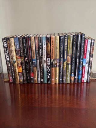 Item #101479 Collection of 23 SIGNED John Grisham Novels, All SIGNED First Edition Books. John...
