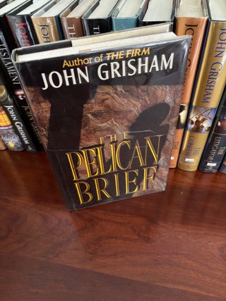 Collection of 23 SIGNED John Grisham Novels, All SIGNED First Edition Books