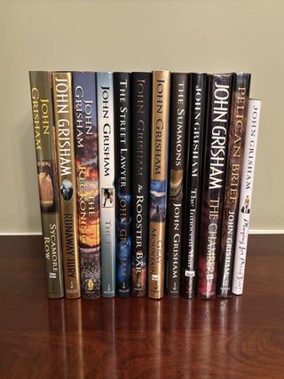 Item #101767 Collection of 12 SIGNED John Grisham Novels, All SIGNED First Edition Books. John...