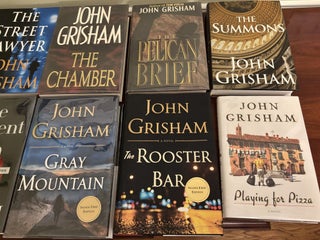 Collection of 12 SIGNED John Grisham Novels, All SIGNED First Edition Books.